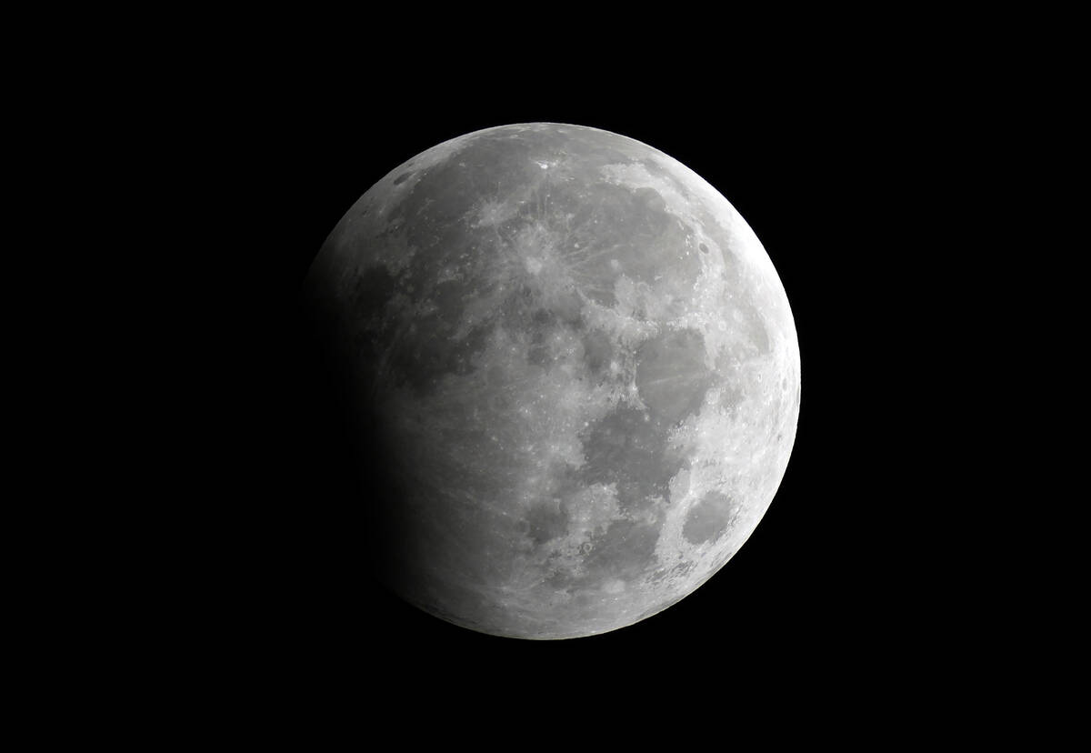 A partial lunar eclipse is seen in Karachi, Pakistan, Oct. 29, 2023. (AP Photo/Fareed Khan, File)