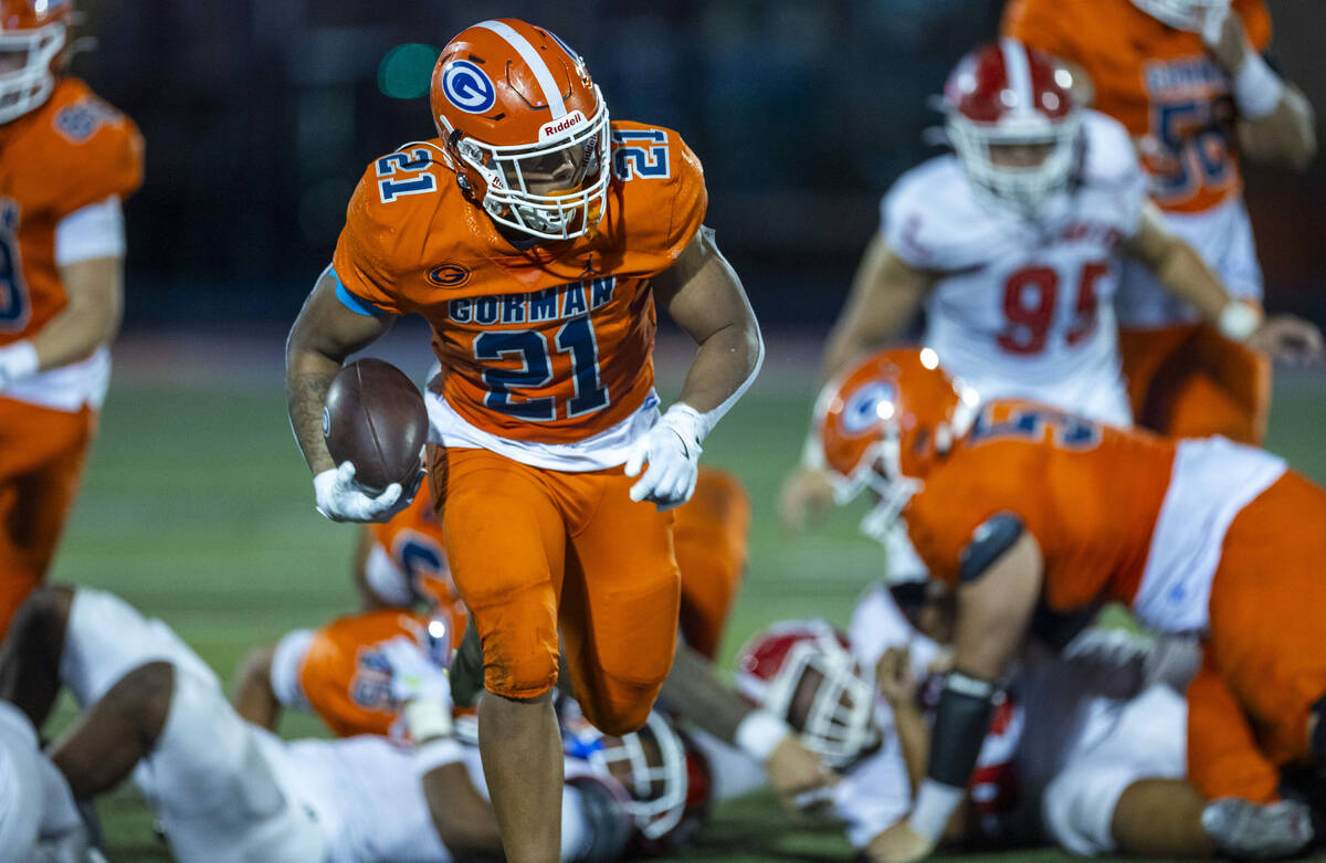 Bishop Gorman running back Jonathan Coar (21) sprints towards the end zone against Orange Luthe ...