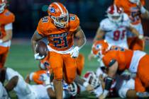 Bishop Gorman running back Jonathan Coar (21) sprints towards the end zone against Orange Luthe ...