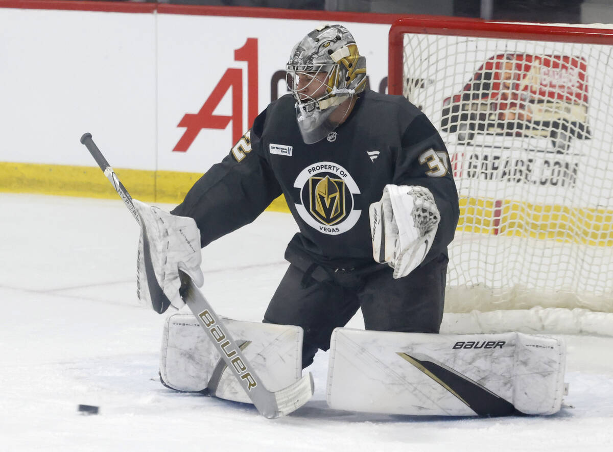 Golden Knights goalie Jesper Vikman (32) blocks a shot during first day of Golden Knights rooki ...