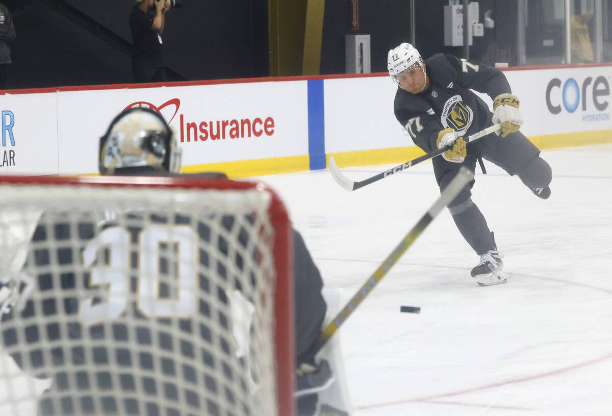 Golden Knights forward Kai Uchacz (77) shoots against goalie Carl Lindbom (30) during first day ...