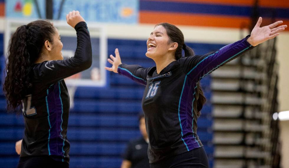 Silverado junior Kalia Roberts (15) celebrates with Silverado senior Suriah Roberts (12) during ...