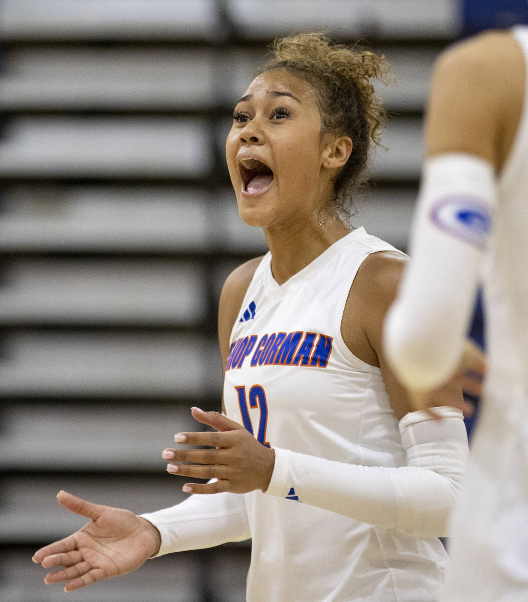 Bishop Gorman junior Brooklynn Williams (12) celebrates a point during the high school volleyba ...