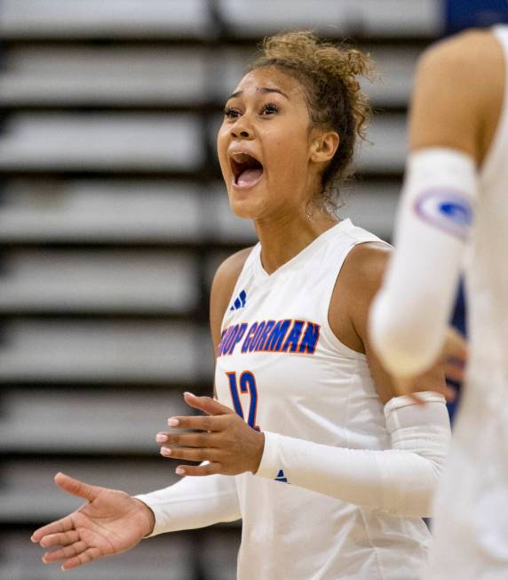 Bishop Gorman junior Brooklynn Williams (12) celebrates a point during the high school volleyba ...