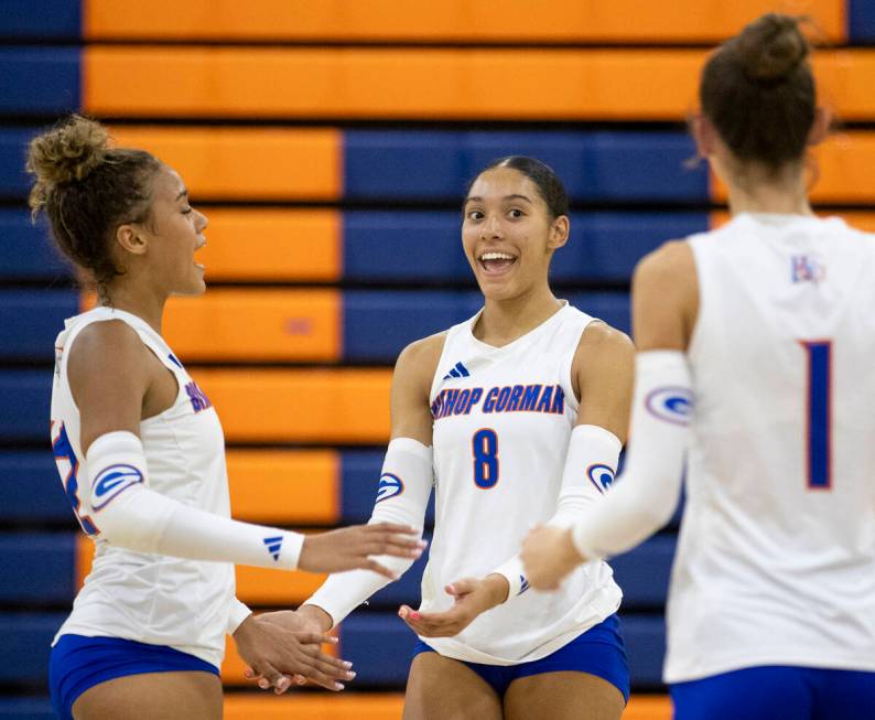 Bishop Gorman junior Ayanna Watson (8) celebrates a point during the high school volleyball gam ...