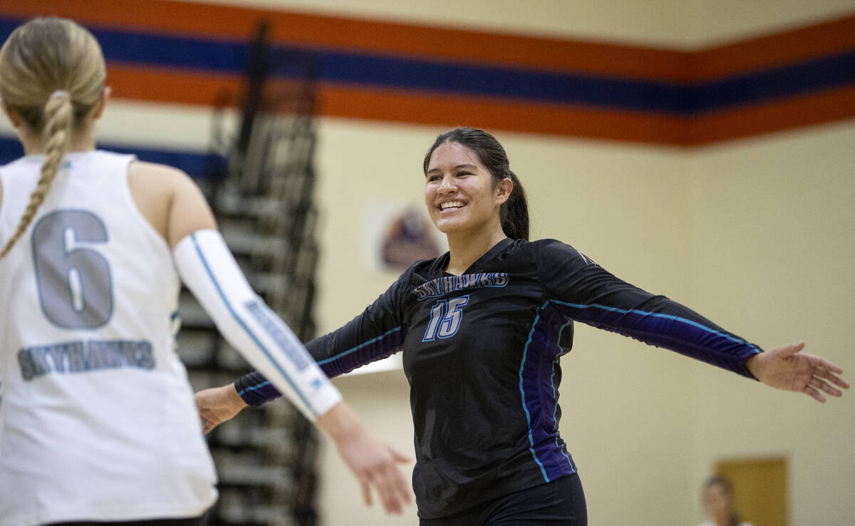 Silverado junior Kalia Roberts (15) celebrates a point during the high school volleyball game a ...