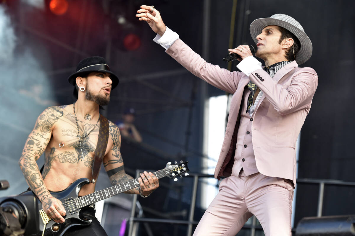 FILE - Dave Navarro, left, and Perry Farrell of Jane's Addiction perform at Lollapalooza on Jul ...