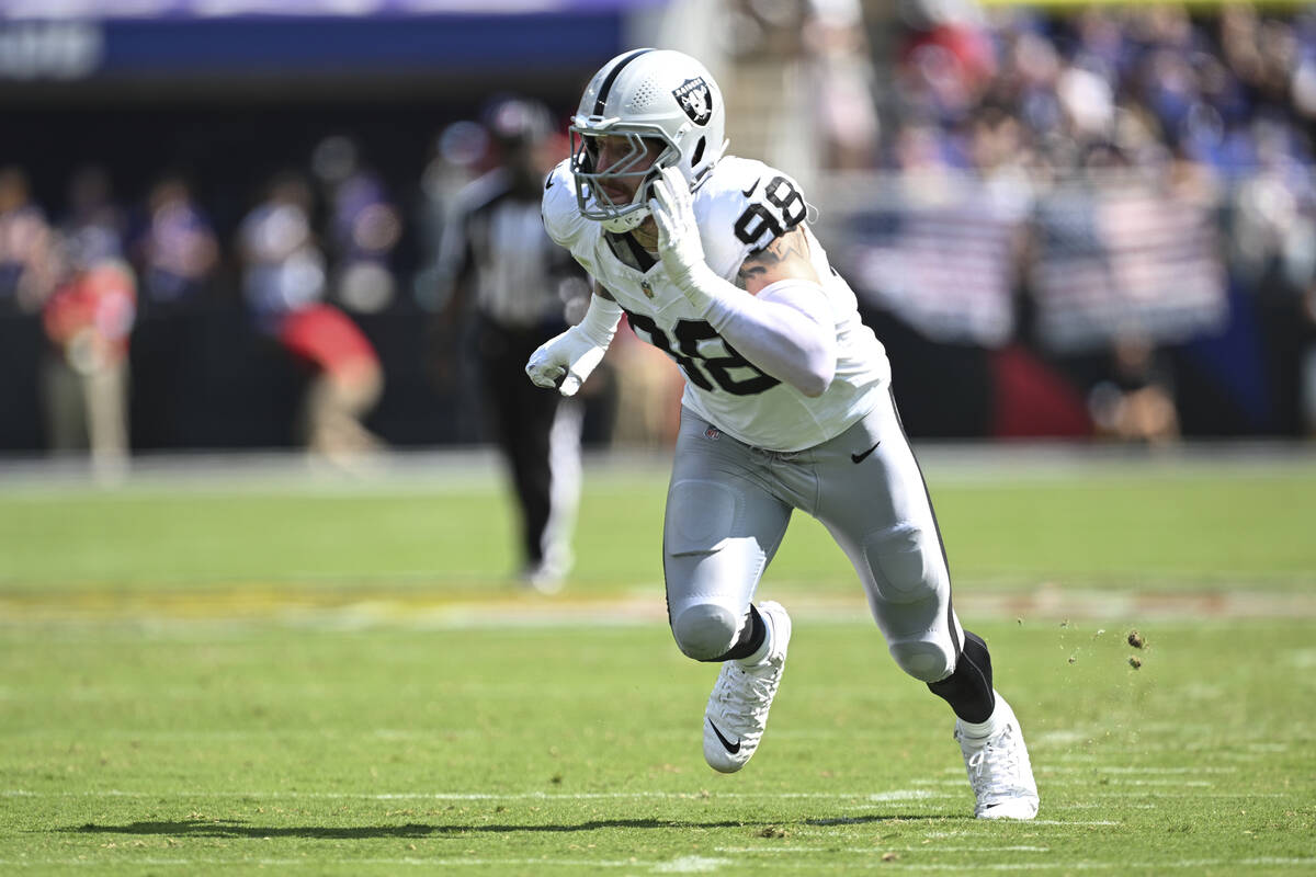 Las Vegas Raiders defensive end Maxx Crosby (98) in action during the first half of an NFL foot ...