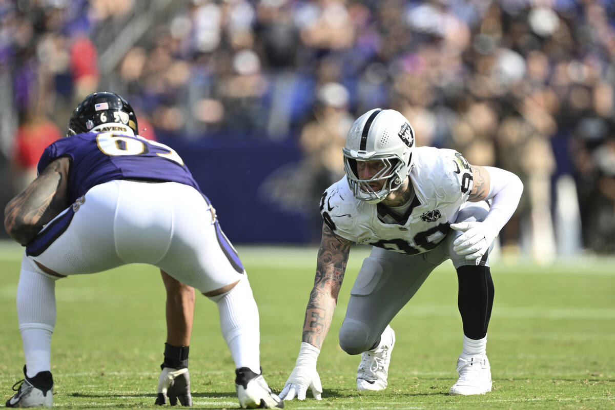 Las Vegas Raiders defensive end Maxx Crosby lines up against Baltimore Ravens guard Patrick Mek ...