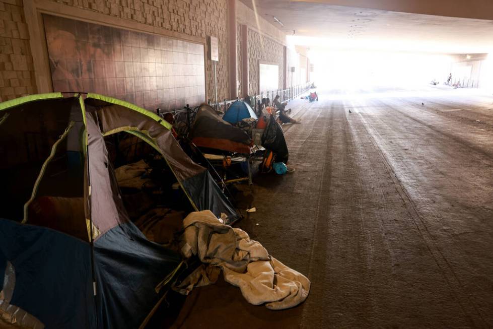 Tents are seen on F Street under Interstate 15 in Las Vegas Thursday, July 25, 2024. (K.M. Cann ...