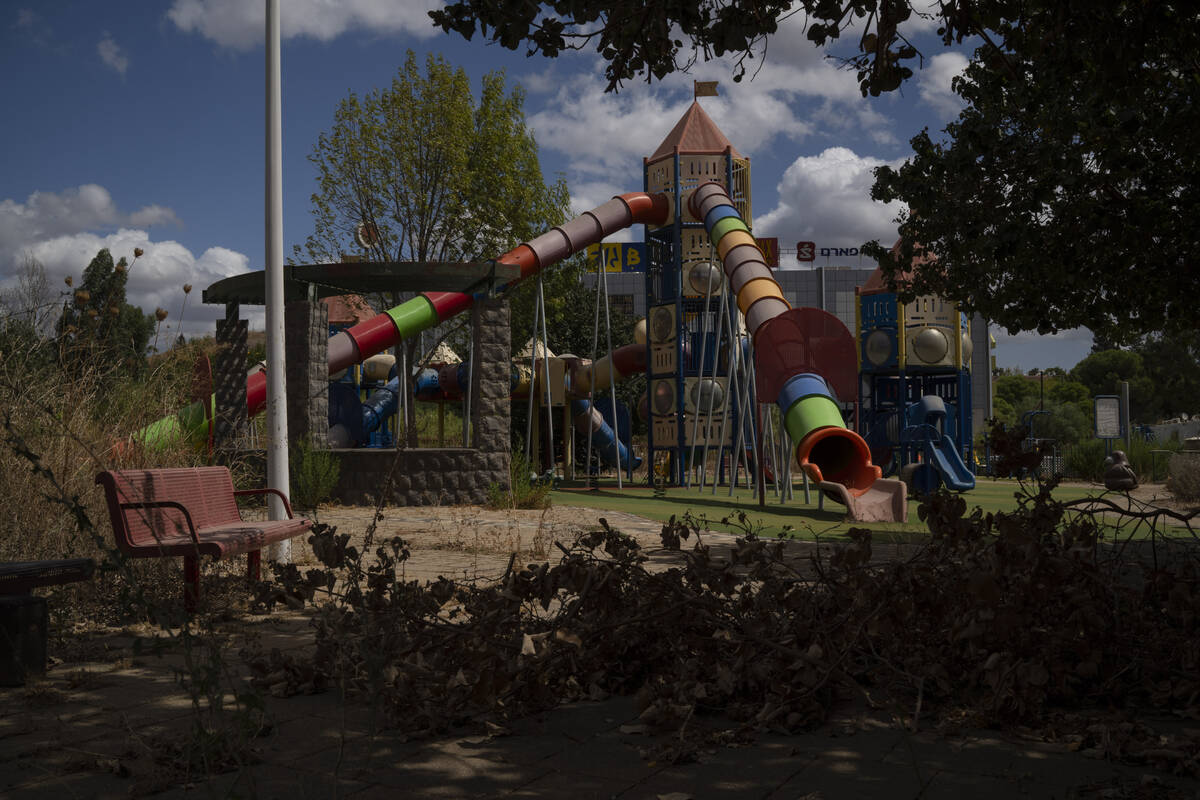 A playground is seen on a square in Kiryat Shmona, a city located next to the border with Leban ...