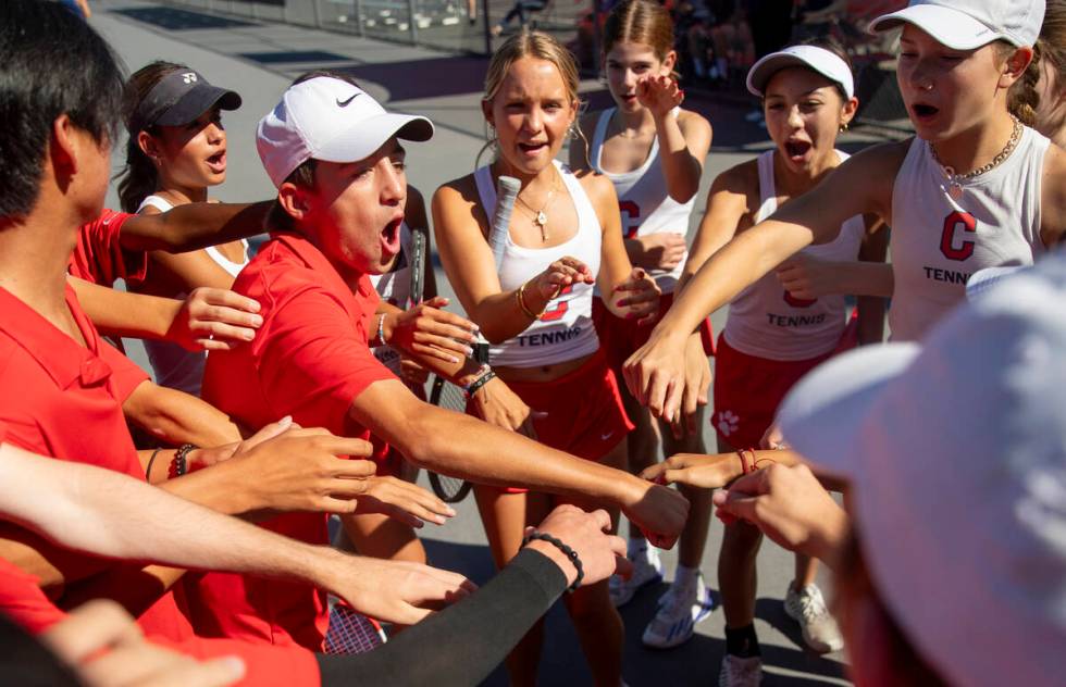 Coronado players huddle together before the high school tennis matches against Basic at Coronad ...