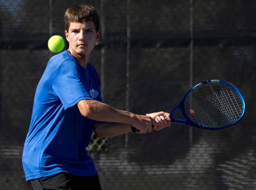 Basic’s Dragon Vukovic competes during the high school tennis matches against Coronado a ...