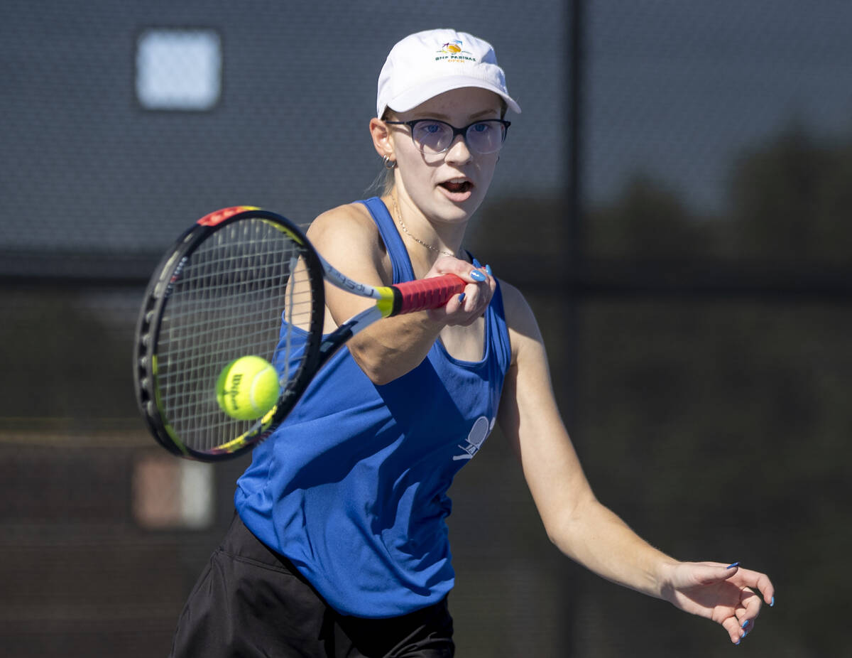 Basic’s Gail Peters competes during the high school tennis matches against Coronado at C ...