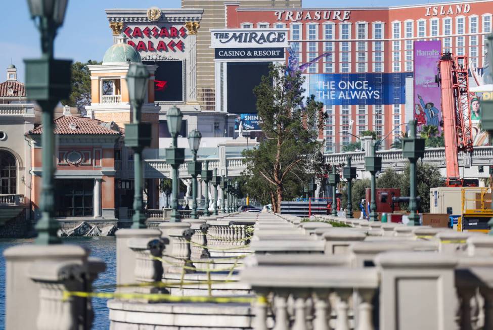 Empty spaces where trees once stood outside the Bellagio hotel-casino in Las Vegas, Tuesday, Se ...