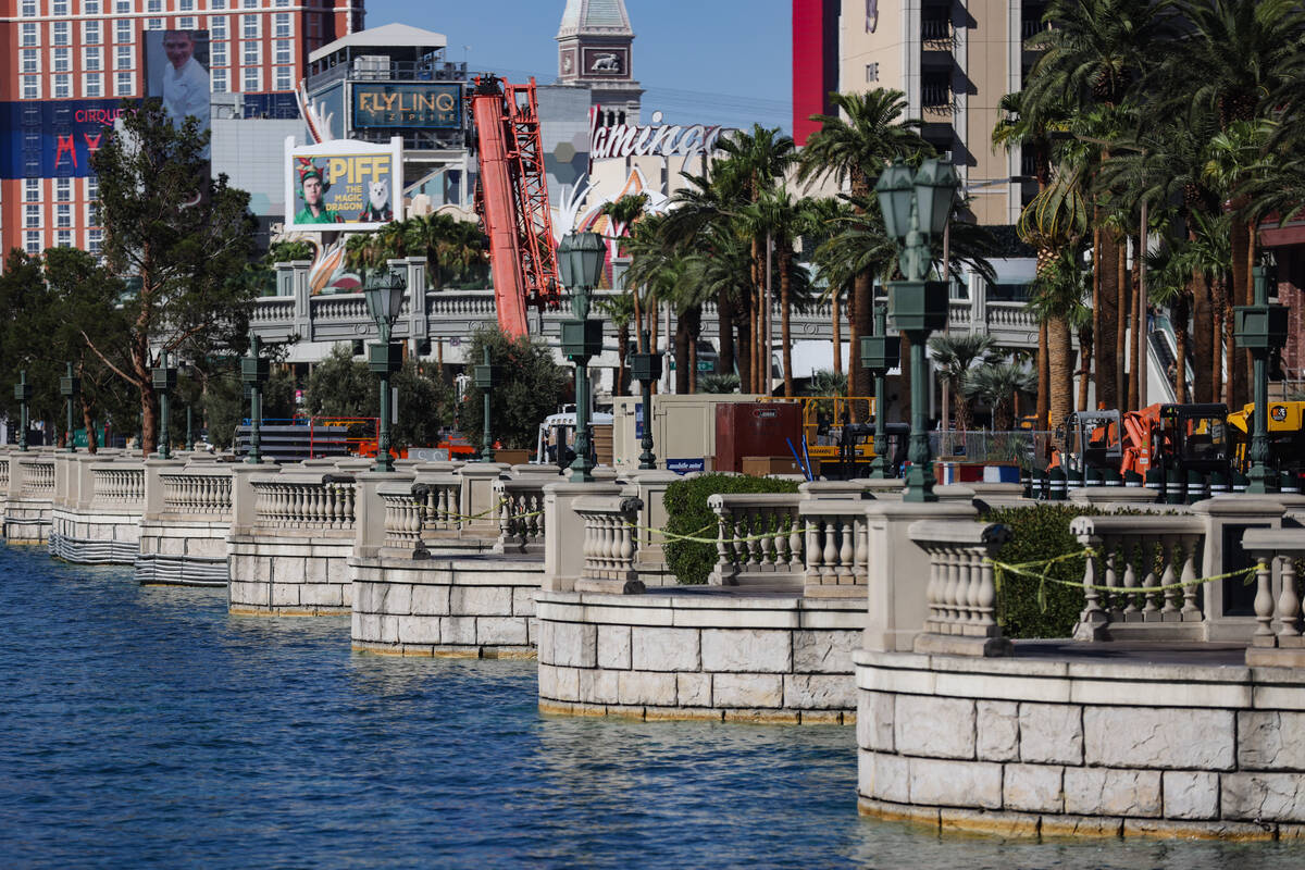 Empty spaces where trees once stood outside the Bellagio hotel-casino in Las Vegas, Tuesday, Se ...