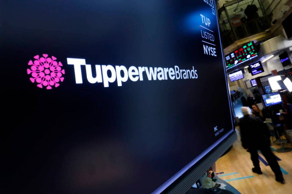 The logo for Tupperware Brands appears on a monitor on the floor of the New York Stock Exchange ...