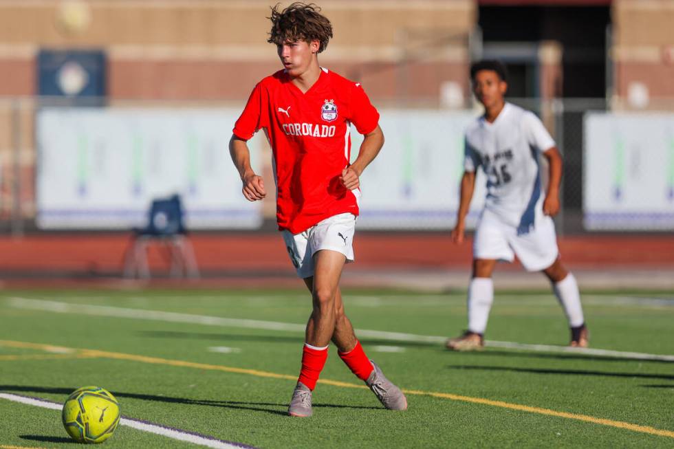 Coronado defender Grayson Elisaldez kicks the ball during a soccer game between Coronado and Pa ...