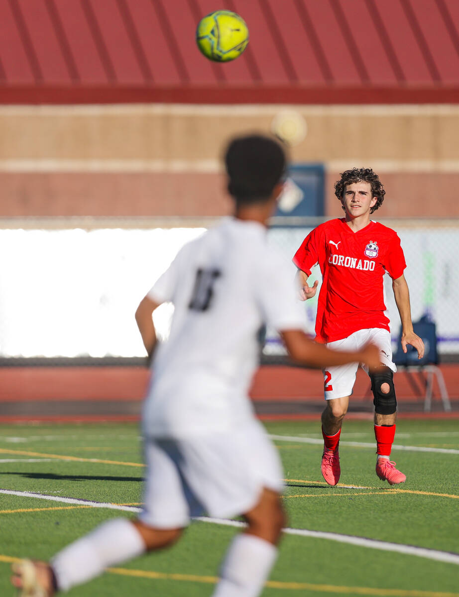 Coronado defender/midfielder Brody Breeden (2) keeps his eye on the ball during a soccer game b ...