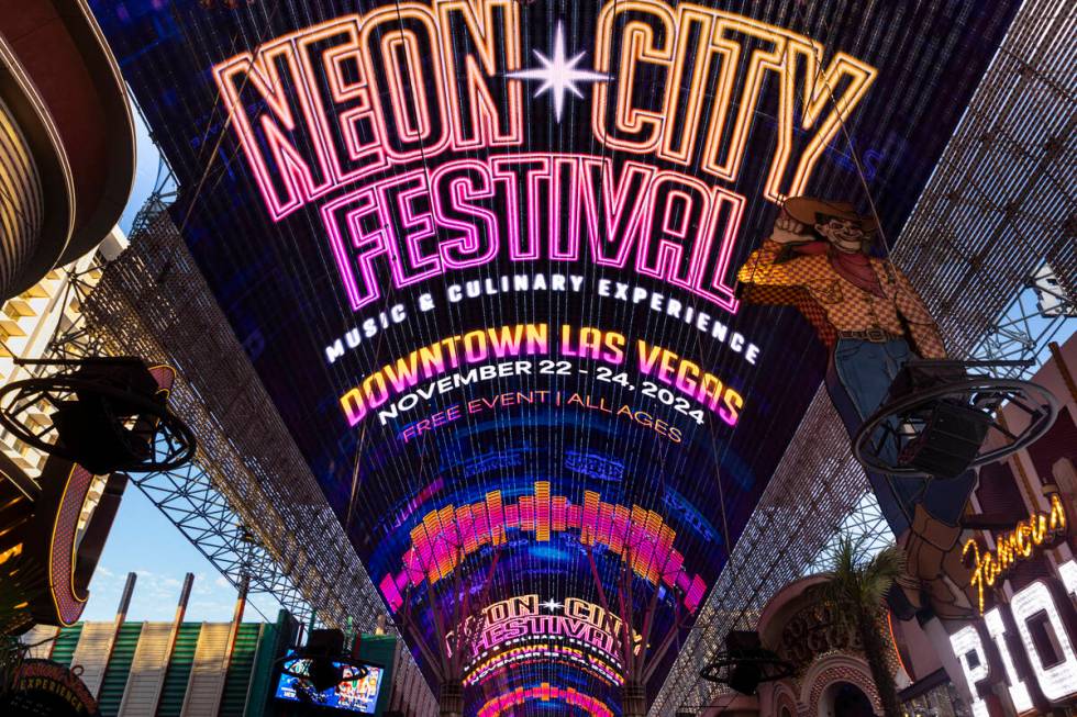 Information for the Neon City Festival is displayed on the Fremont Street Experience canopy&#xa ...