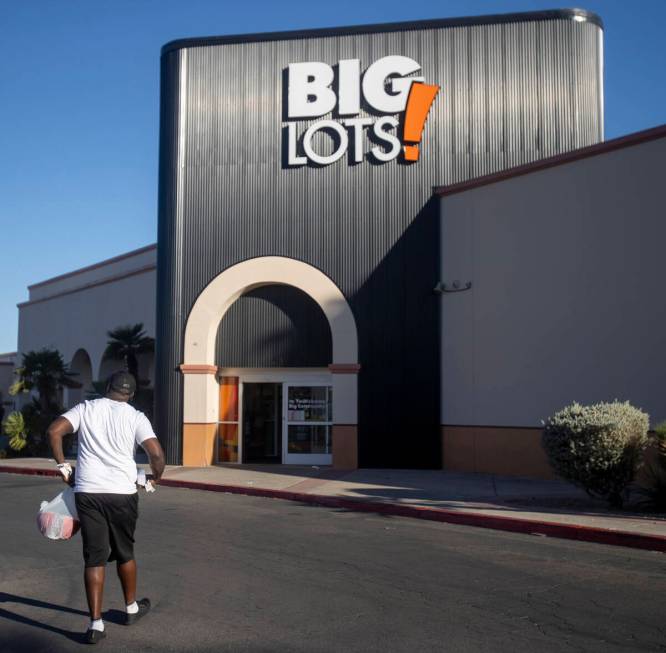 A man walks toward a Big Lots, Wednesday, Sept. 18, 2024, in Las Vegas. Seven Big Lots within t ...