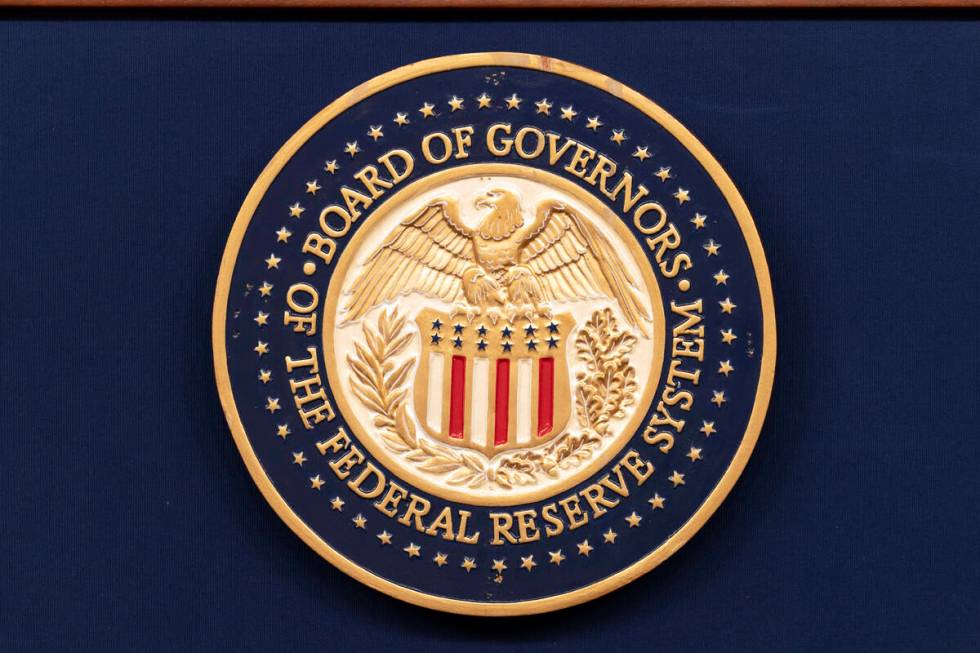 FILE - The seal of The Federal Reserve System is seen during a news conference by Federal Reser ...