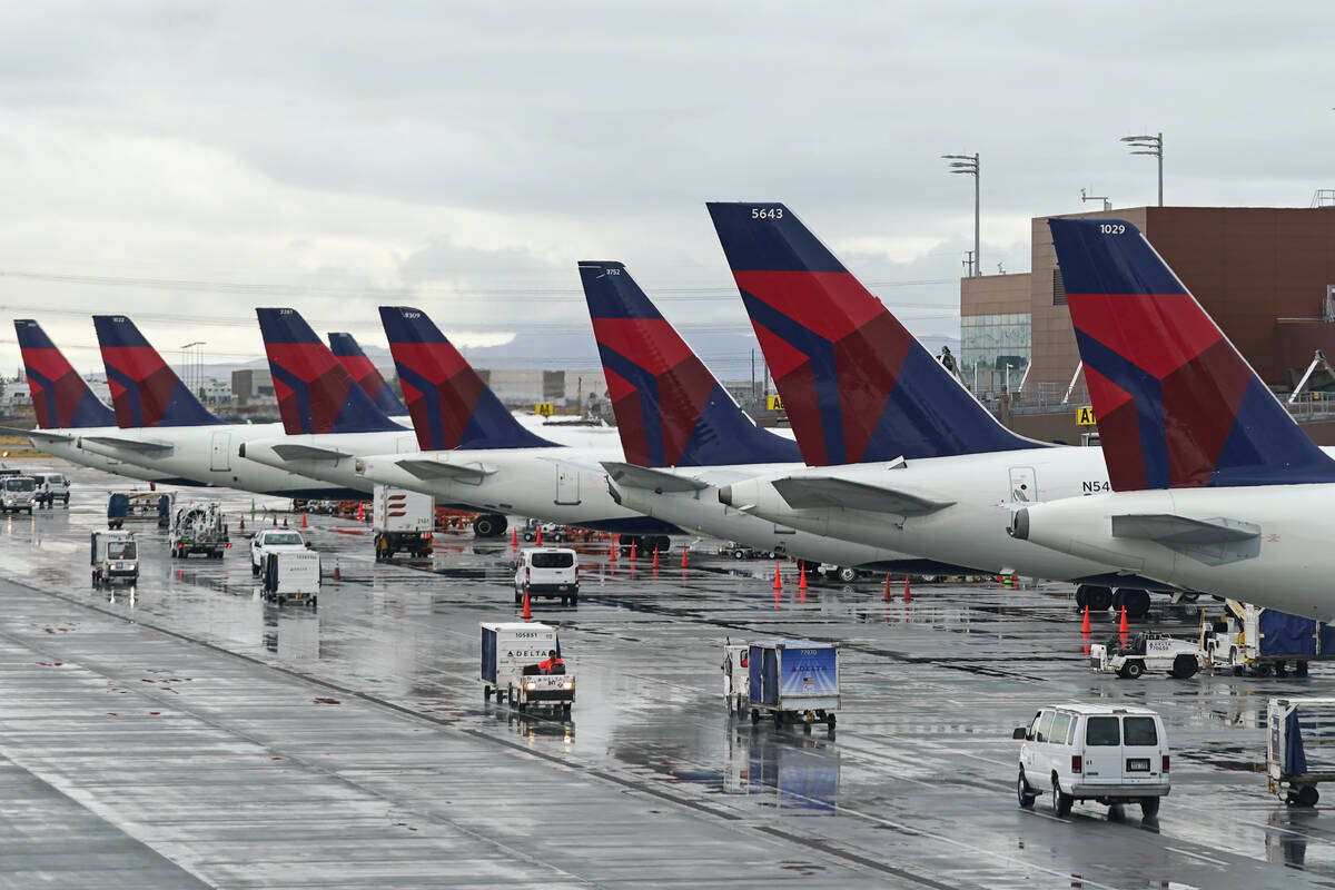 Delta planes sit at their gates on June 13, 2022, at Salt Lake City International Airport, in S ...