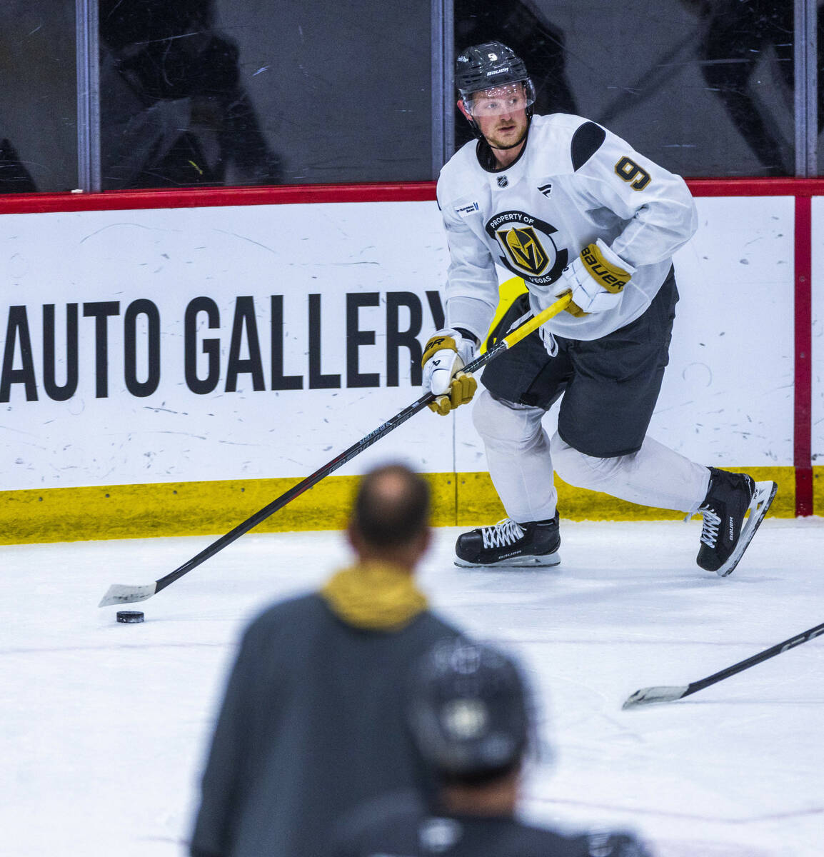 Golden Knights center Jack Eichel (9) advances the puck during the first day of training camp a ...