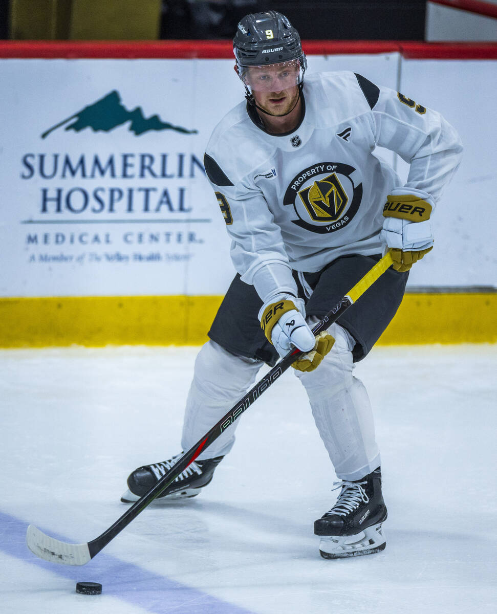 Golden Knights center Jack Eichel (9) advances the puck during the first day of training camp a ...