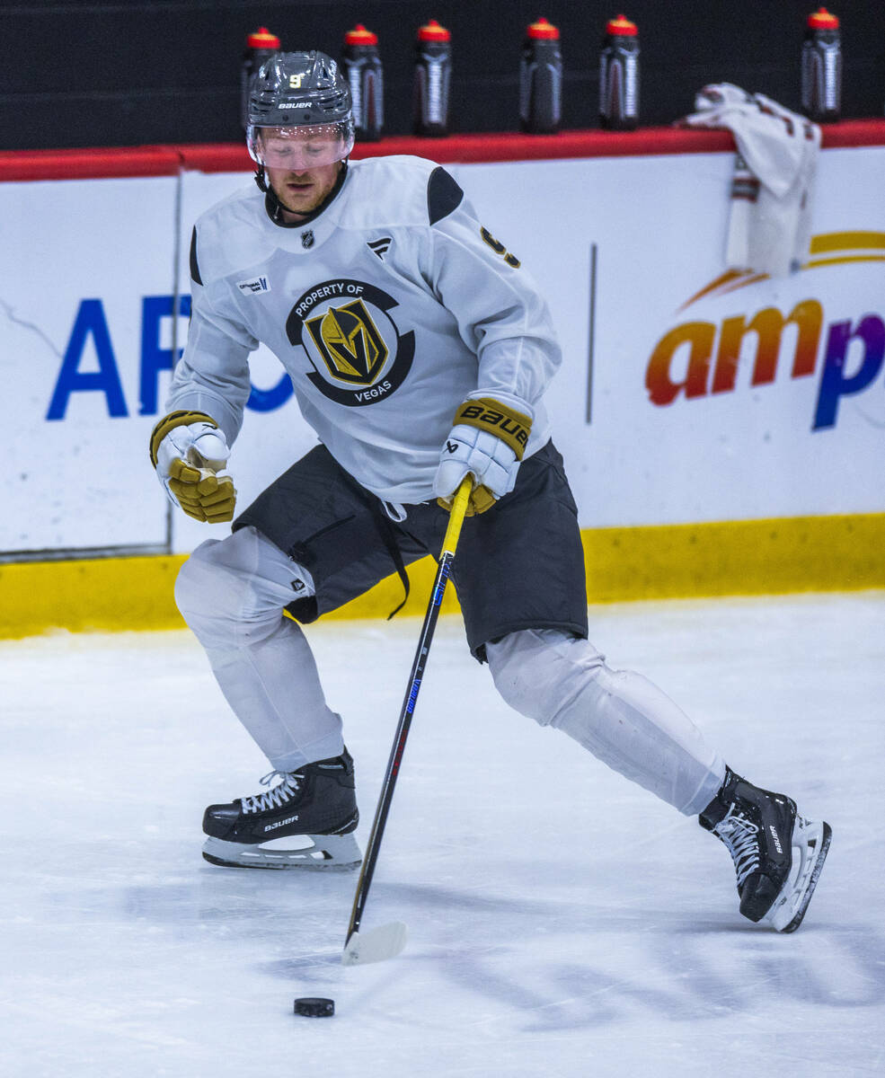 Golden Knights center Jack Eichel (9) advances the puck during the first day of training camp a ...