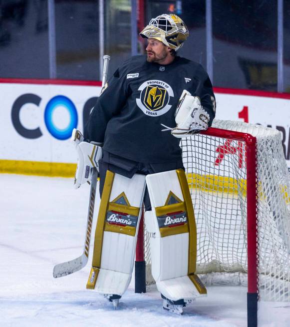 Golden Knights goaltender Adin Hill (33) looks to his teammates during the first day of trainin ...