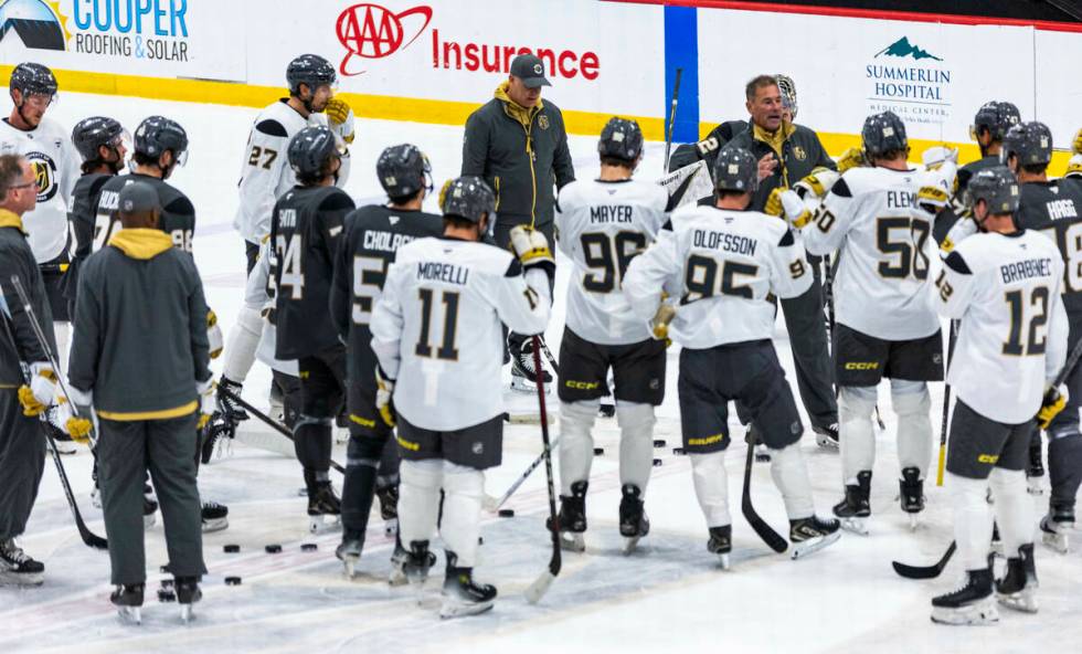 Golden Knights Head Coach Bruce Cassidy speaks to his players on the ice during the first day o ...