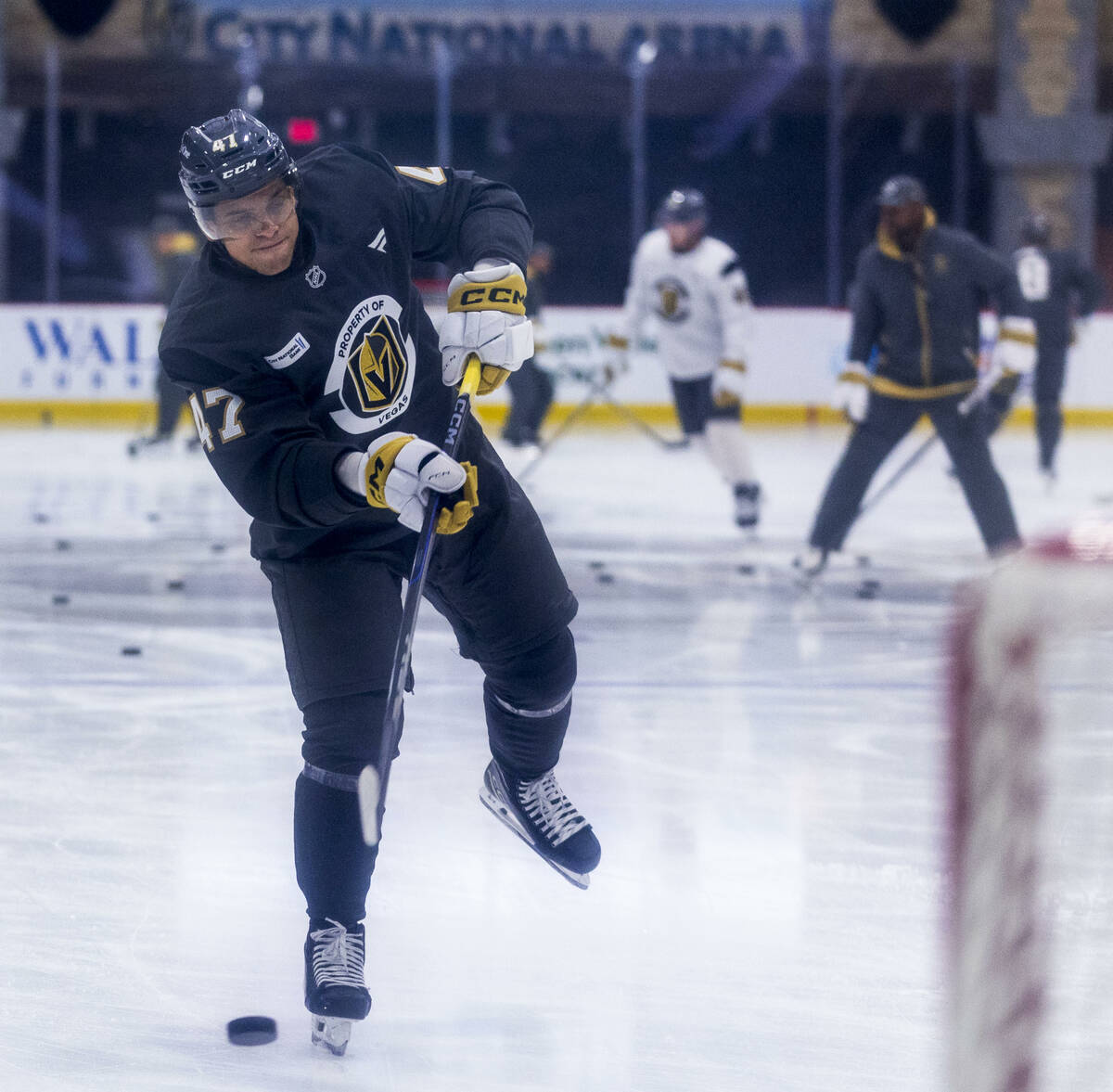 Golden Knights forward Grigori Denisenko (47) takes a shot on goal during the first day of trai ...