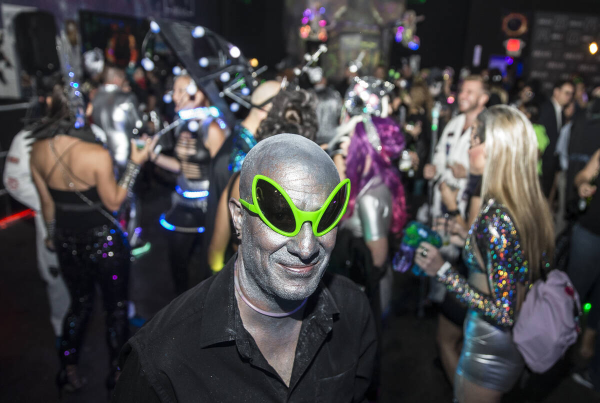 Seth Stylz dresses as a silver and green alien during a pre party for Storm Area 51 on Thursday ...