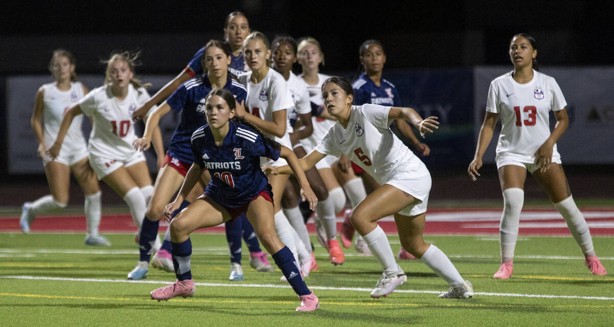 Coronado and Liberty players watch the ball during the high school soccer game at Liberty High ...