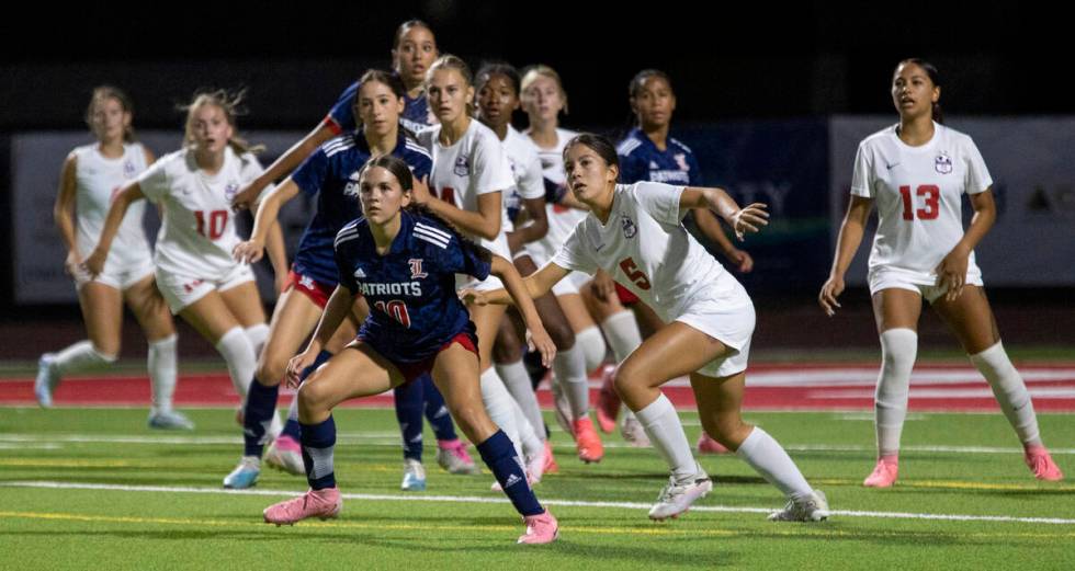 Coronado and Liberty players watch the ball during the high school soccer game at Liberty High ...