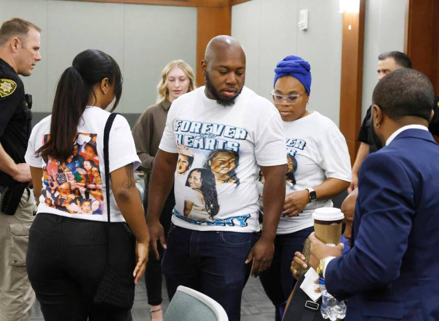 Gary Jackson, center, a brother of a murder victim Destiny Nicole Jackson, and family members a ...