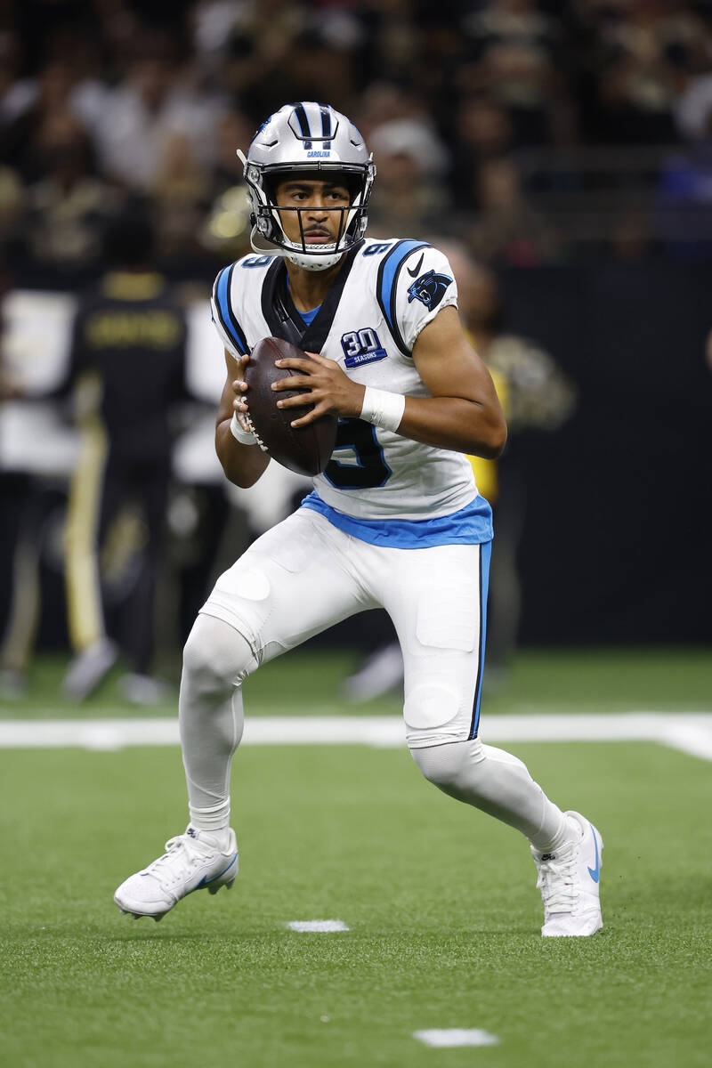 Carolina Panthers quarterback Bryce Young (9) looks to pass during an NFL football game against ...