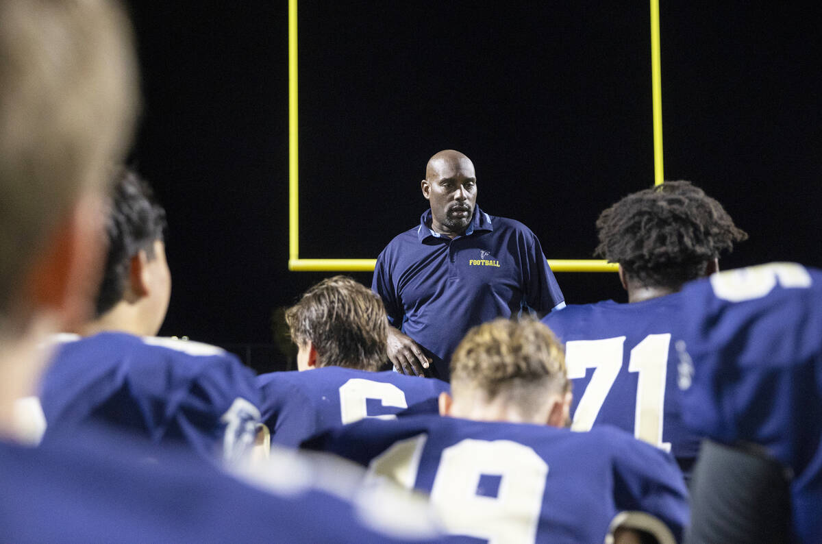 Foothill Head Coach Vernon Brown talks to the team after the high school football game against ...