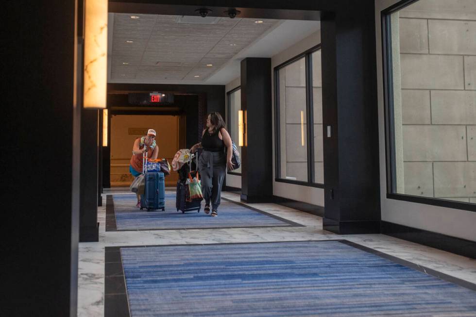 Customers walk through the new Skybridge at the Paris Las Vegas, Friday, Sept. 20, 2024, in Las ...