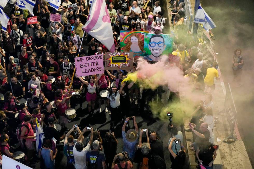 People protest against Prime Minister Benjamin Netanyahu's government and call for the release ...