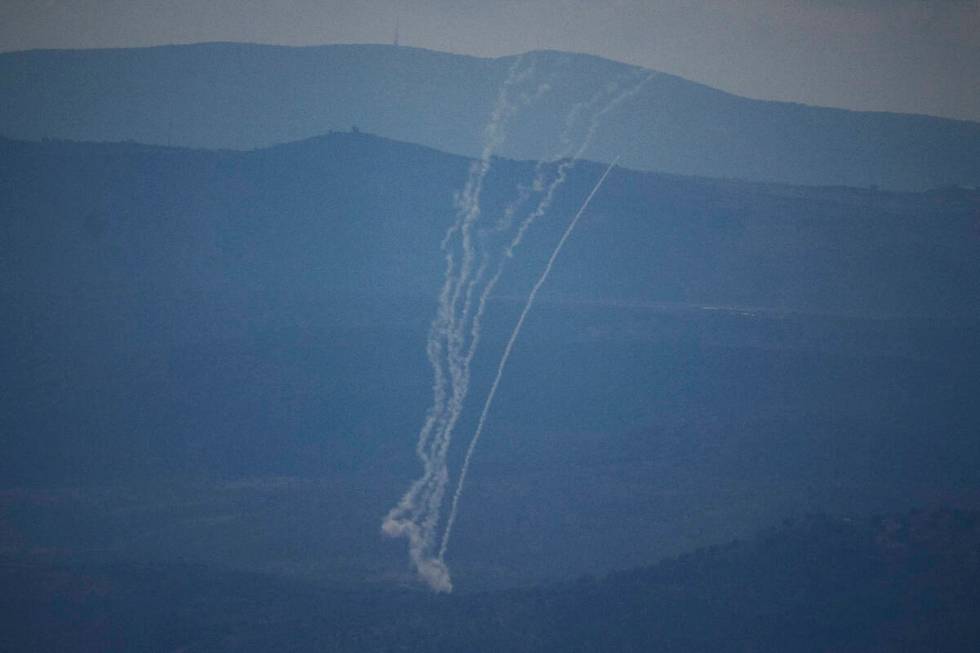 Israeli Iron Dome air defense system fires to intercept rockets that were launched from Lebanon ...