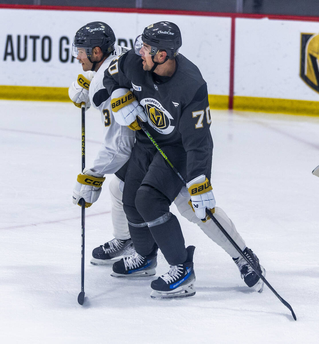 Golden Knights defenseman Brayden McNabb (3) battles for position against forward Tanner Pearso ...