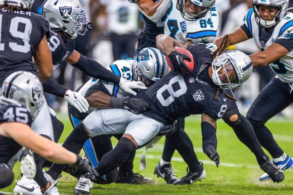 Raiders running back Ameer Abdullah (8) is taken down by Carolina Panthers linebacker Charles H ...