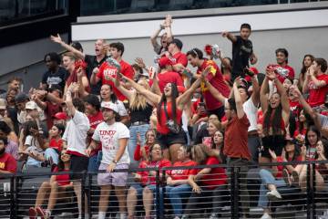 UNLV fans celebrate after Utah Tech misses a field goal during the college football game at All ...