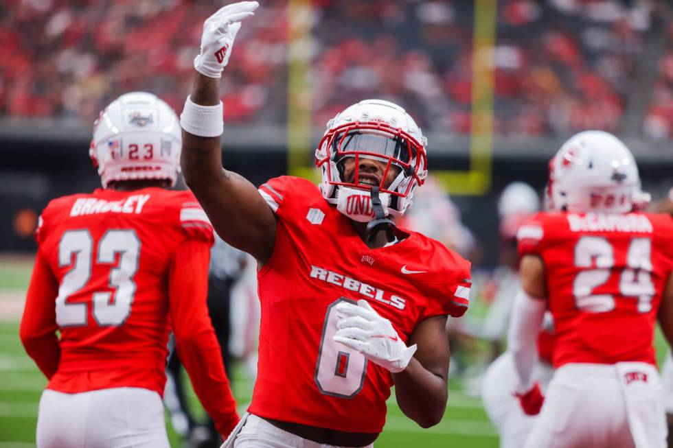 UNLV defensive back Jeremiah Vessel (6) pumps up the crowd during an NCAA football game between ...