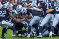 Raiders quarterback Gardner Minshew (15) is sacked by Carolina Panthers linebacker Shaq Thompso ...