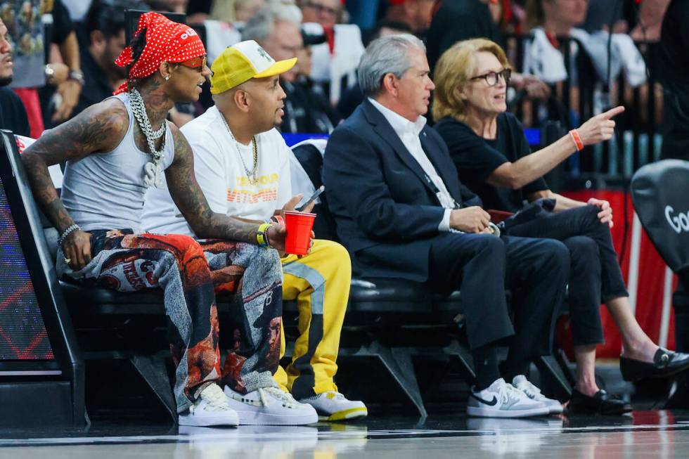 Rapper Swae Lee watches game action during game one of a WNBA playoff game between the Aces and ...