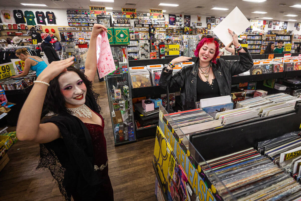 Chappell Roan fans Megumi Biggs, left, and Layne Lieber dance to “Hot To Go!” dur ...