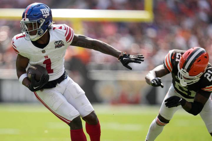 New York Giants wide receiver Malik Nabers (1) runs against Cleveland Browns cornerback Denzel ...